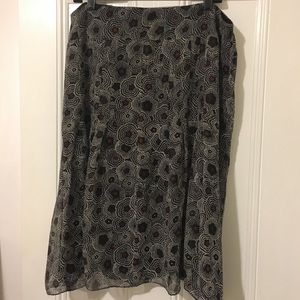 Sheer, flowing skirt.